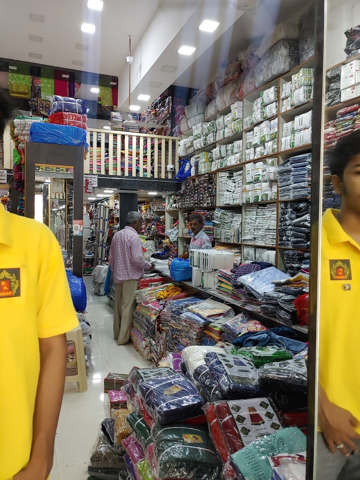 Interior wholesale shelves stacked with garment cartons